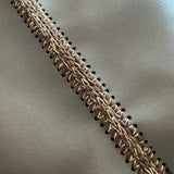 Detalle del tejido de lurex y algodón reciclado del bolso Mikado Bronce.